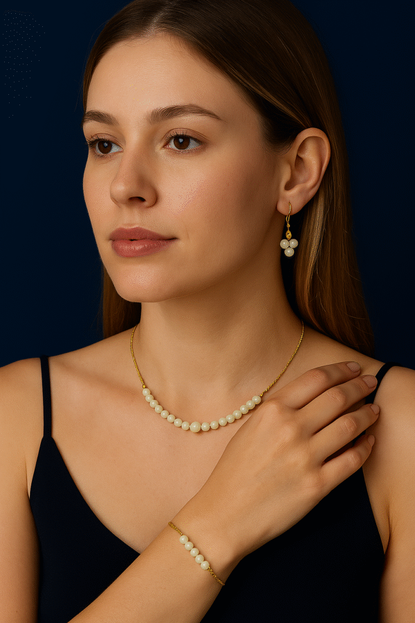 ivory pearl set with gold chain
