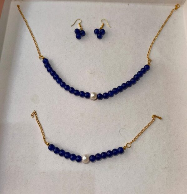 royal blue beaded set with pearl accents