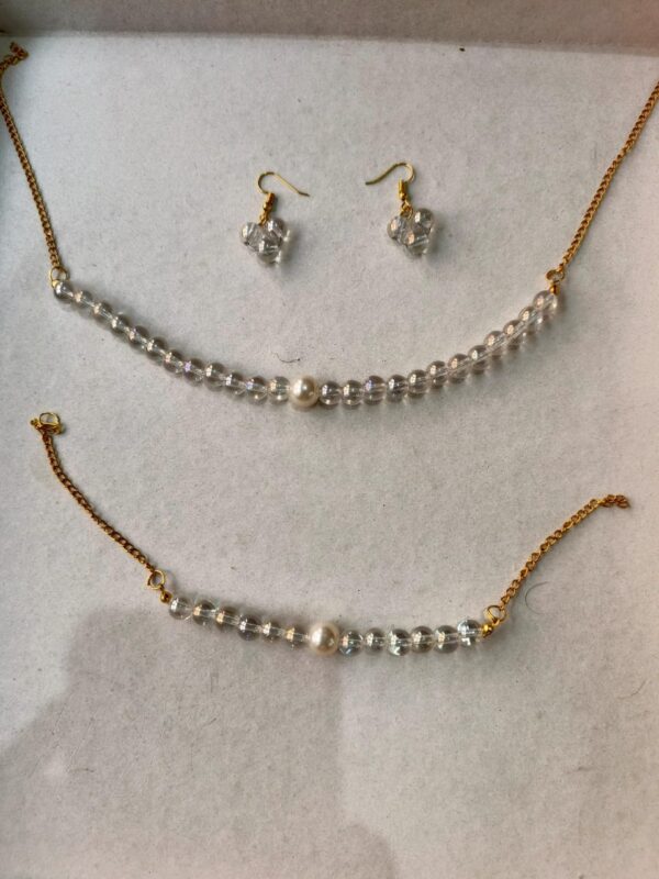 clear crystal beaded set with pearl accents