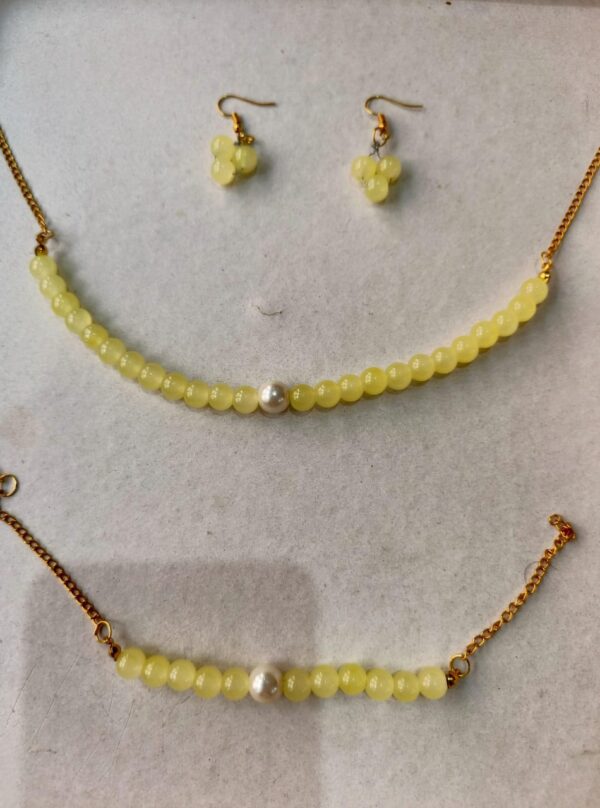 lemon yellow set with pearl accents