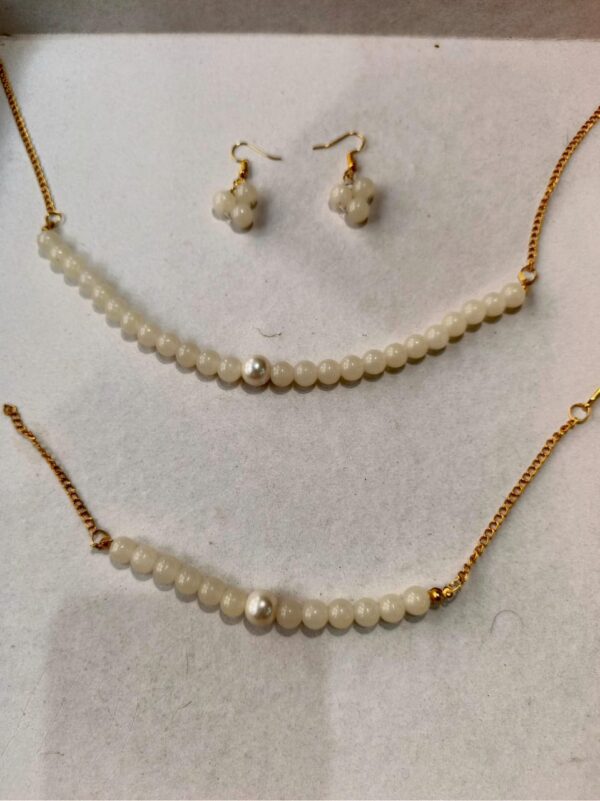 classic white pearl beaded set with pearl accents