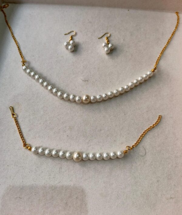 classic white pearl beaded set with pearl accents